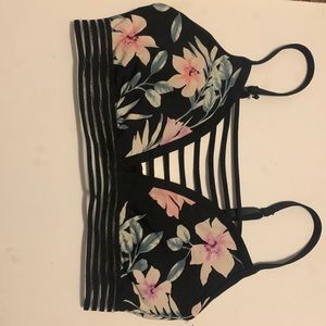 It’s light cushion on boob area and very comfy has ribs in front on chest